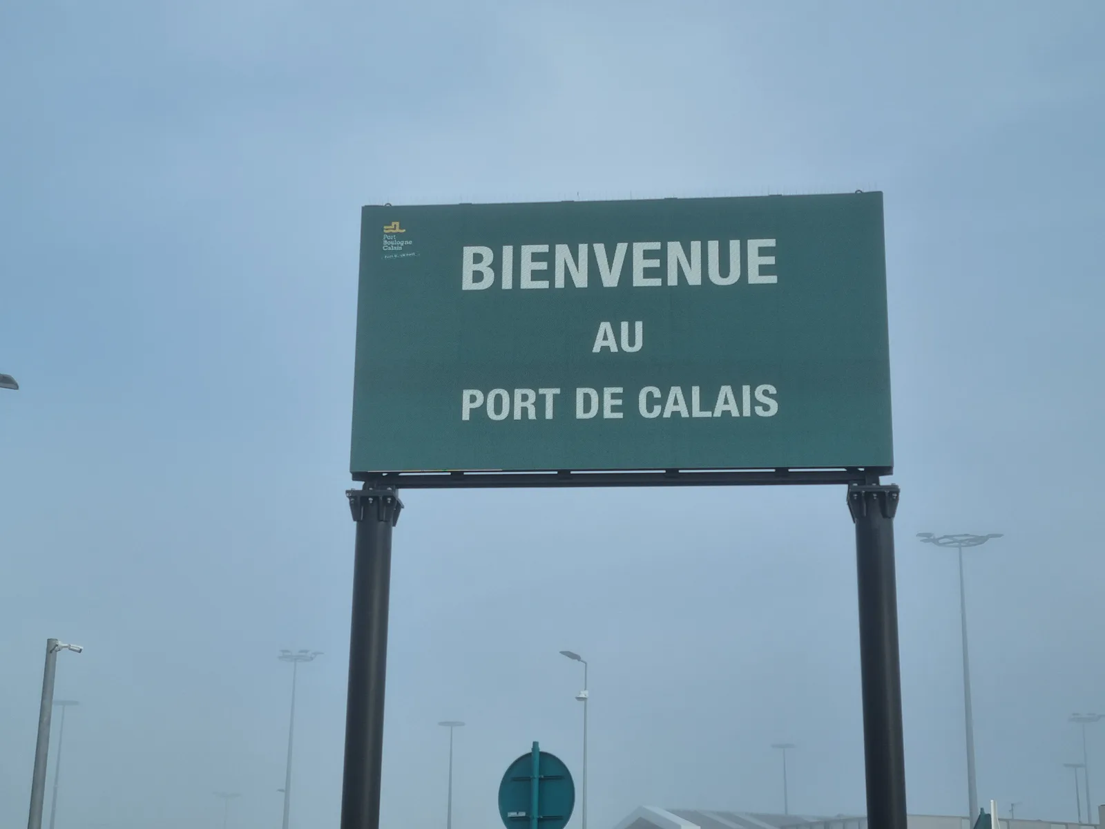 The sign on the way out of the port: Bienvenue au Port de Calais